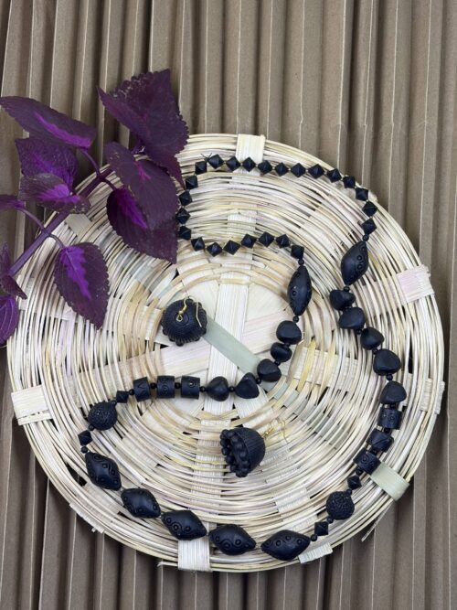 Mrida Dhara Terracotta Necklace Set Handmade grey terracotta necklace set with geometric beads by Matee